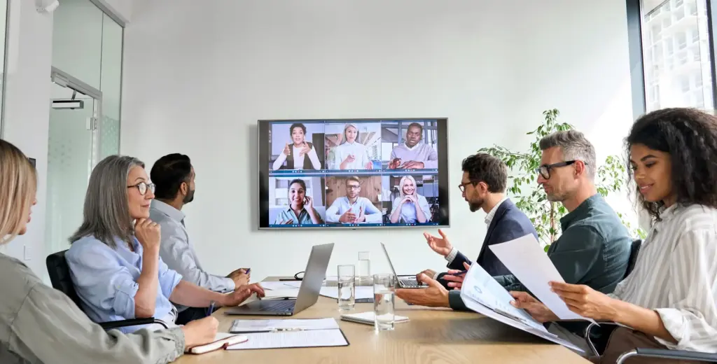 Global team in a virtual training session reviewing training investment benchmarks